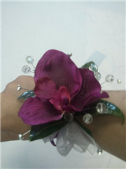 Silk orchid and glitter wristcorsage